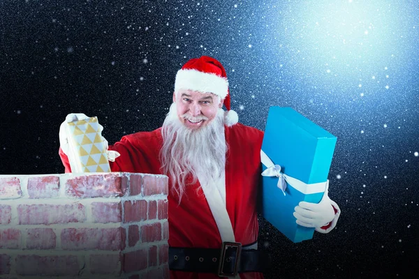 Kerstman met geschenkdozen — Stockfoto