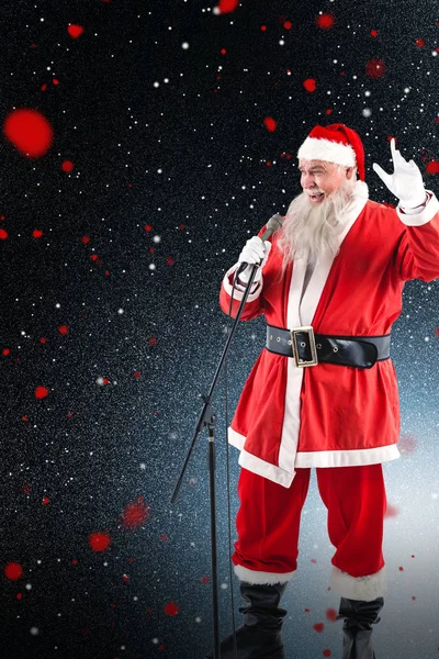 Santa claus zingen kerstliederen — Stockfoto