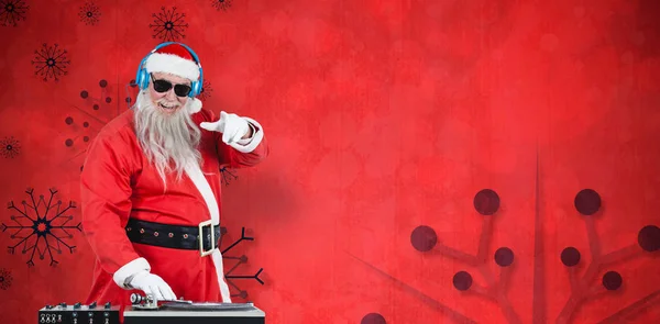 Santa claus playing sound mixer — Stock Photo, Image