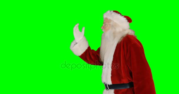 Santa claus giving flying kiss — Stock Video