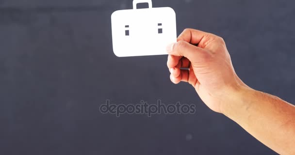 Ręka trzyma papieru wycięte z teczki — Wideo stockowe