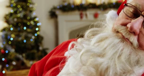 Santa claus relaxing and sleeping — Stock Video