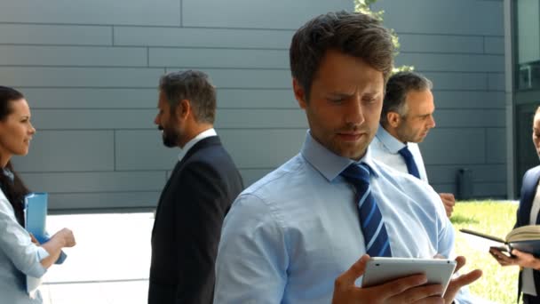 Businessman using digital tablet — Stock Video