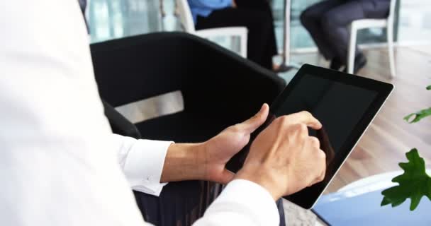 Businessman using digital tablet — Stock Video