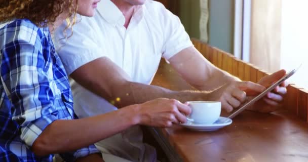 Couple using digital tablet — Stock Video