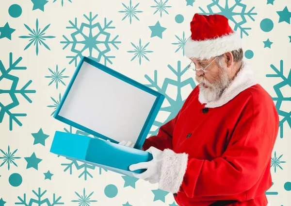 Sorpreso Babbo Natale apre il suo regalo di Natale — Foto Stock