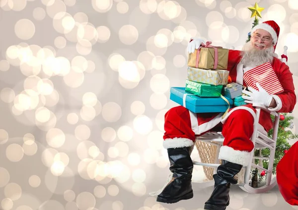 Santa met stapel Kerstcadeaus — Stockfoto