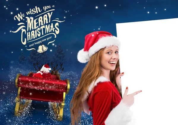 Frau im Weihnachtsmannkostüm zeigt auf Plakat — Stockfoto