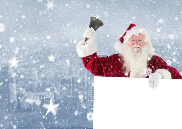 Santa claus holding een lege bordje en bell — Stockfoto
