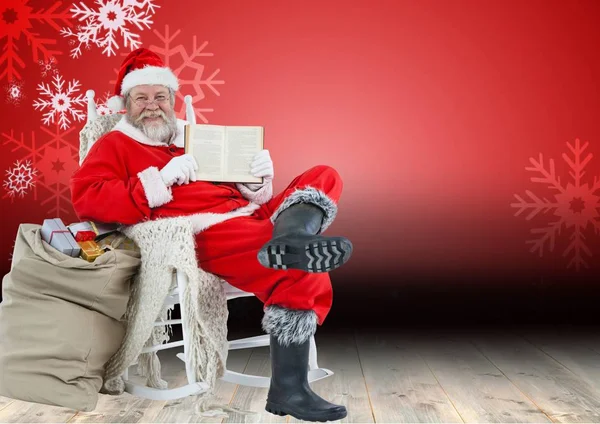 Santa claus sitting on chair — Stock Photo, Image