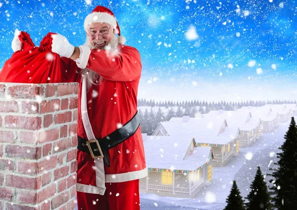 Santa usuwanie dar worek z komina — Zdjęcie stockowe