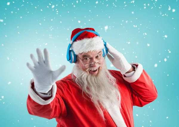 Santa gebaren tijdens het luisteren muziek — Stockfoto