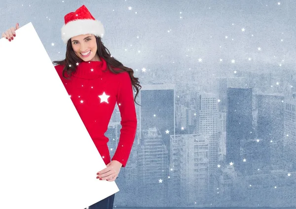 Woman in santa hat holding a blank placard — Stock Photo, Image