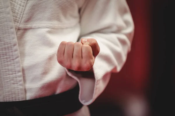 Karate player in black belt — Stock Photo, Image