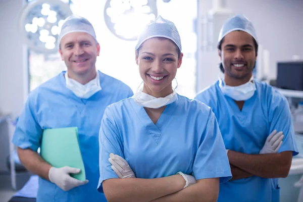 Surgeons standing with arms crossed — Stock Photo, Image