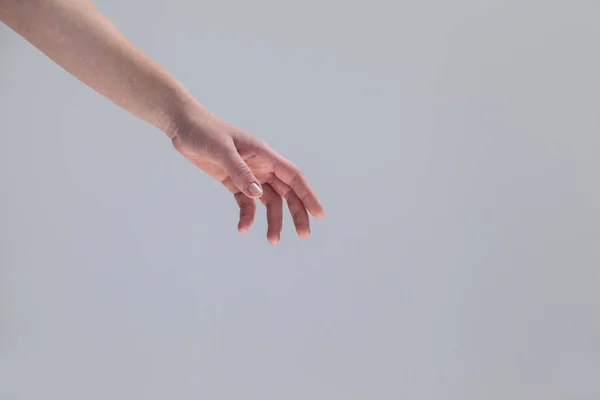 Mano de una mujer haciendo gestos — Foto de Stock