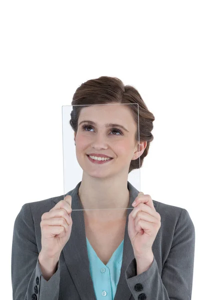 Businesswoman pretending to hold tablet — Stock Photo, Image