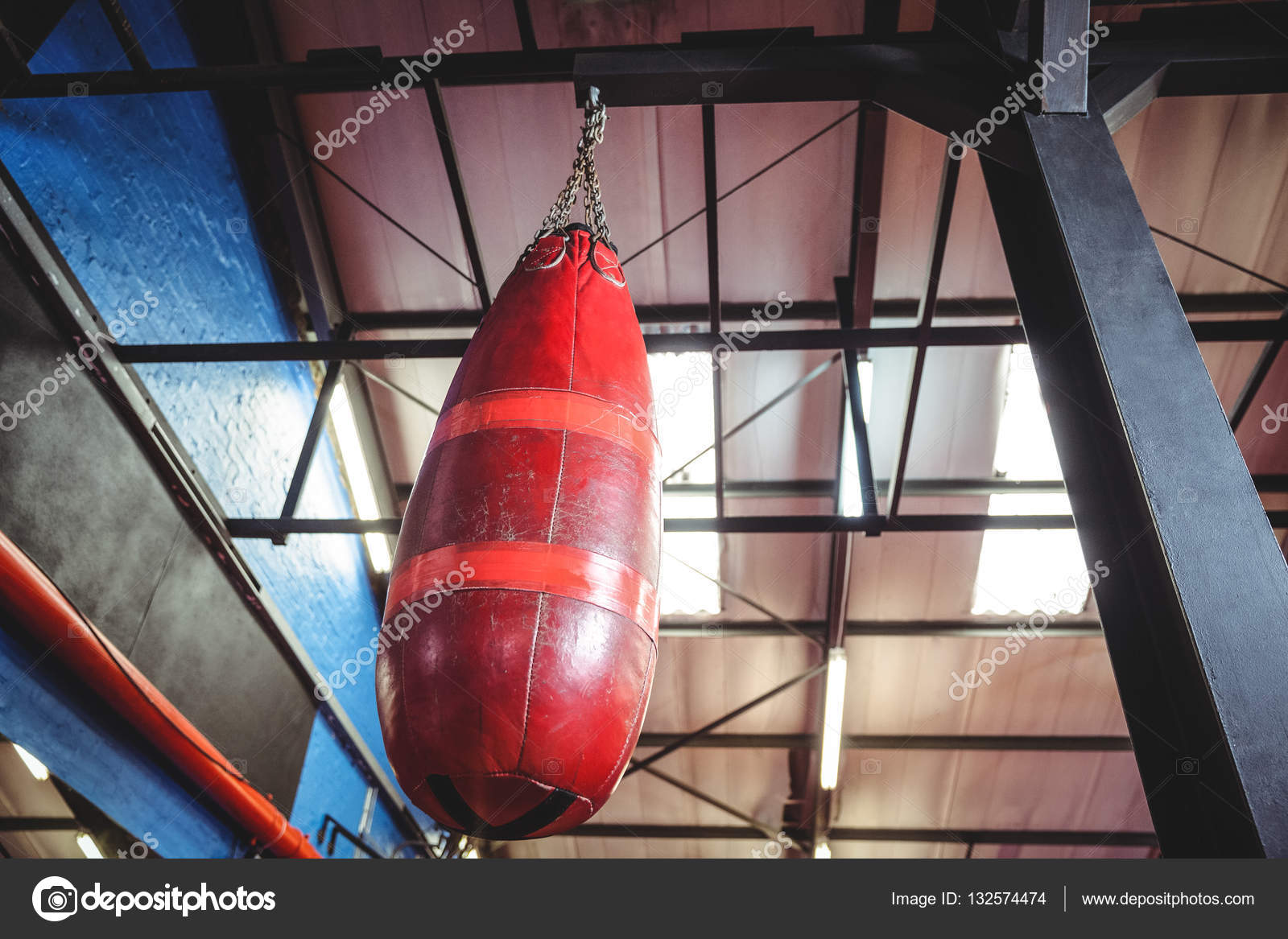Punching Bag Hanging From Ceiling Stock Photo Wavebreaka Punching Bag Hanging From Ceiling Stock Photo