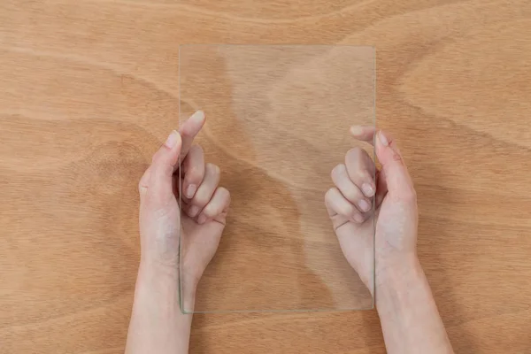 Hands pretending to hold digital tablet — Stock Photo, Image