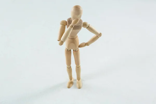 Tensed wooden figurine — Stock Photo, Image