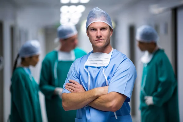 Male nurse standing in corridor — Stock Photo, Image