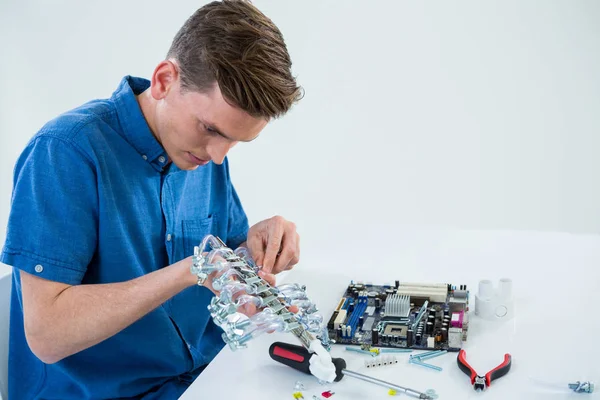 Computer engineer repairing computer motherboard — Stock Photo, Image