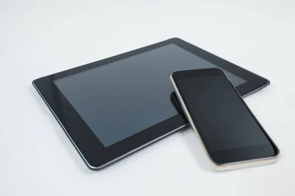 Tablet digital e celular — Fotografia de Stock