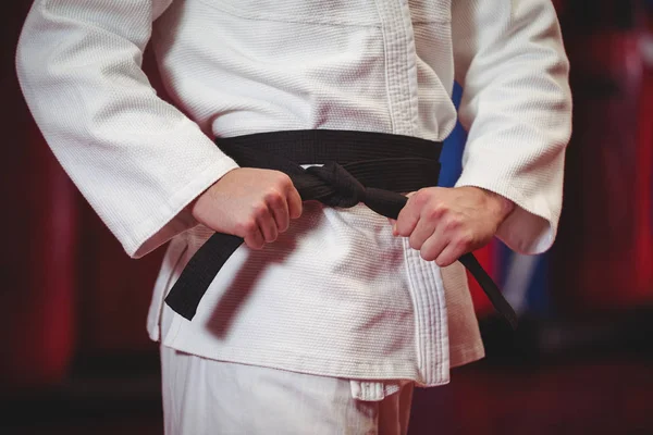 Karate player in black belt — Stock Photo, Image