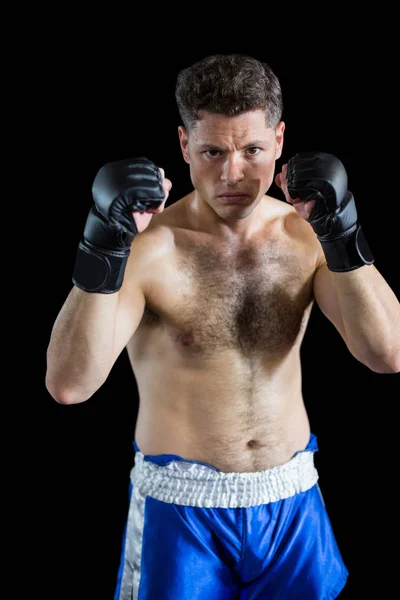 Boxer utför boxning hållning — Stockfoto