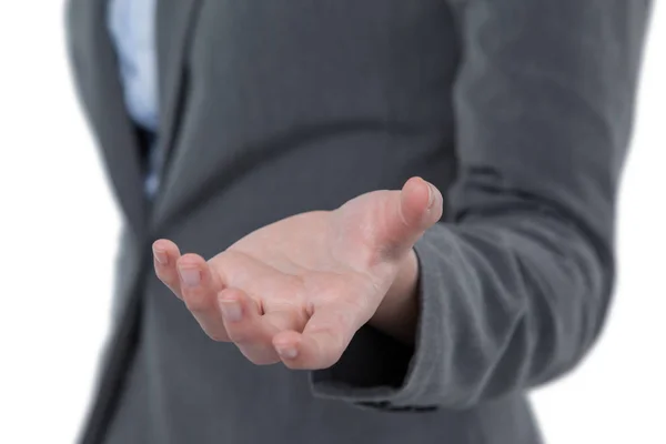 Businesswoman gesturing against white — Stock Photo, Image