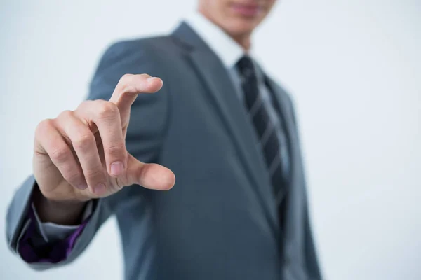 Businessman making hand gesture — Stock Photo, Image