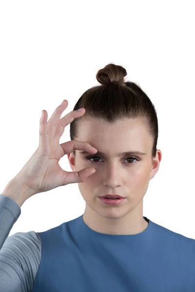 Woman gesturing against white — Stock Photo, Image