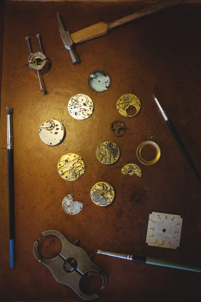 Horologists workshop with clock repairing tools — Stock Photo, Image