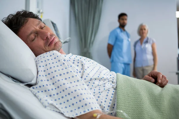 Close-up of patient sleeping on bed — Stock Photo, Image