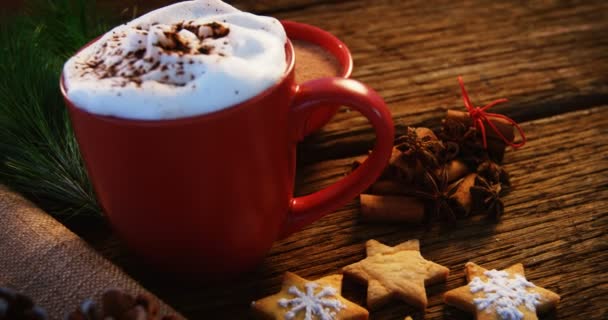 Coffee mug with christmas cookies — Stock Video