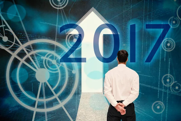 Composite image of businessman turning his back to camera — Stock Photo, Image