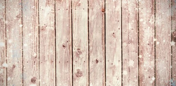 Snow against grey wooden planks — Stock Photo, Image