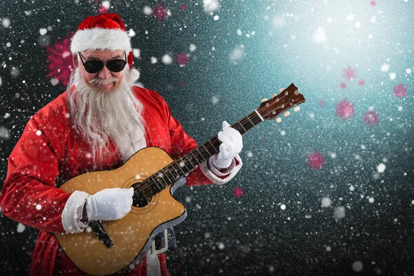 Kerstman spelen gitaar — Stockfoto