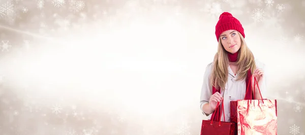 Blonde holding shopping bags — Stock Photo, Image