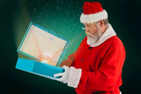 Santa claus otevírání krabičky — Stock fotografie