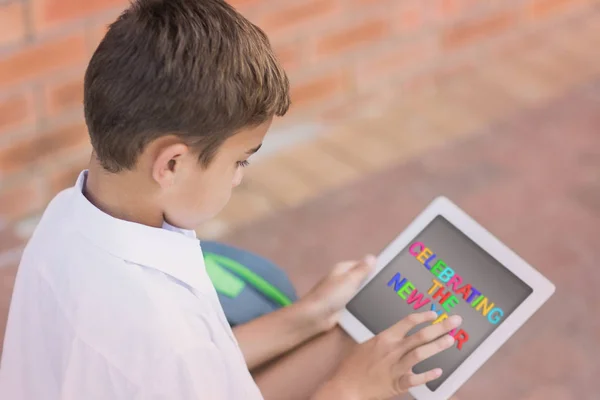 Boy using digital tablet — Stock Photo, Image