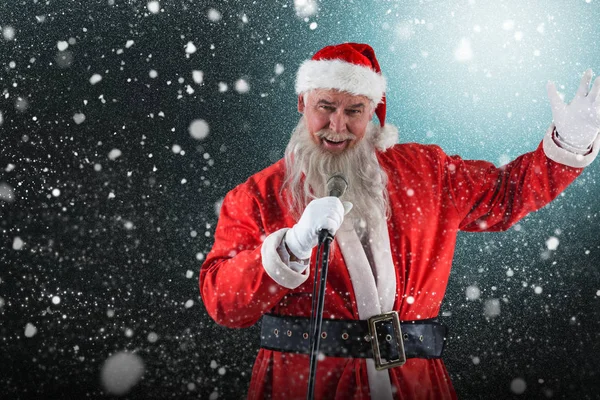 Papai Noel cantando canções de Natal — Fotografia de Stock