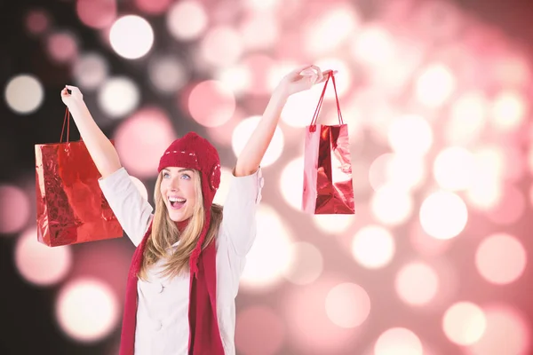 Blonde carrying shopping bags — Stock Photo, Image