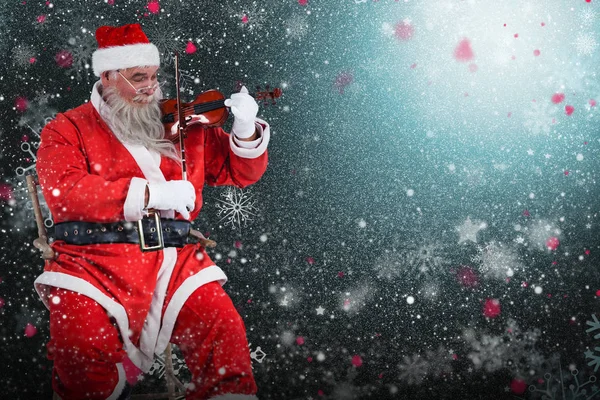 Usmíval se santa claus hrají housle — Stock fotografie