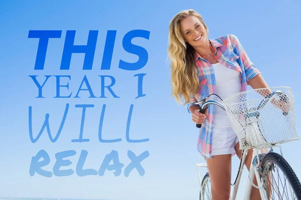 Woman smiling and riding bike — Stock Photo, Image