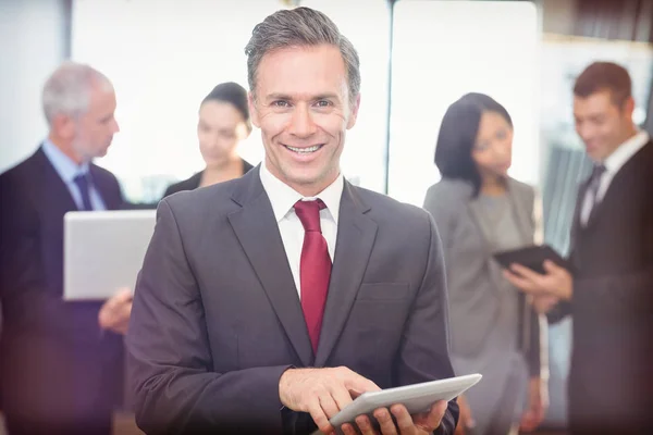 Businessman using digital tablet — Stock Photo, Image