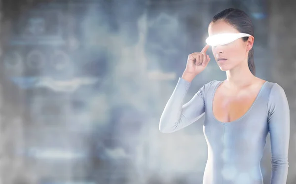 Young woman using virtual video glasses Stock Image