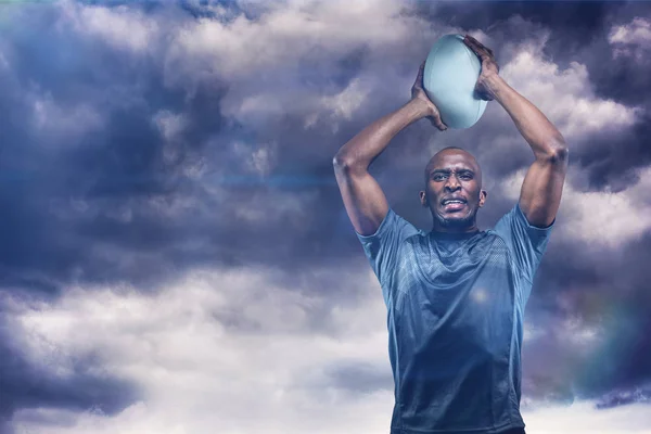 Композиция о решительном мужчине, бросающем мяч в регби 3D — стоковое фото