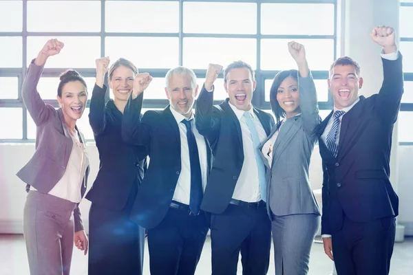 Empresario animando con el puño cerrado — Foto de Stock