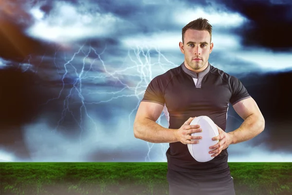 Composite image of tough rugby player looking at camera 3D — Stock Photo, Image